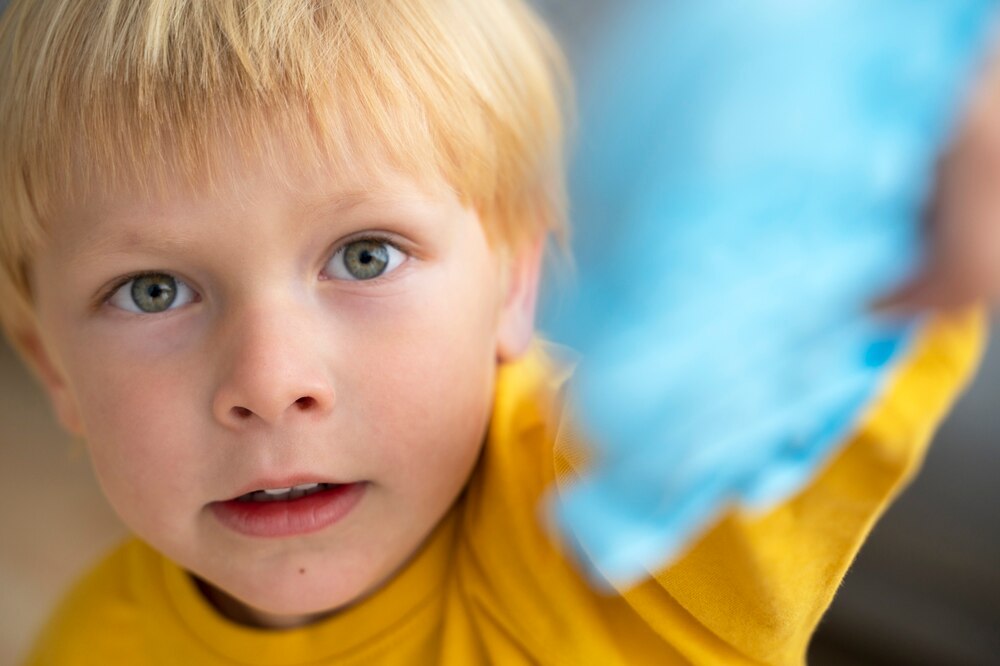 Young kid playing with fidget at home